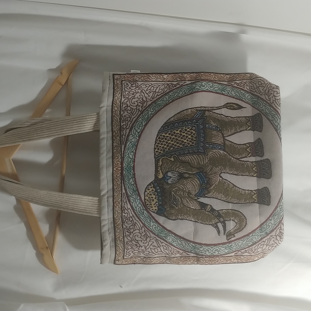 Embroidered canvas bag.
